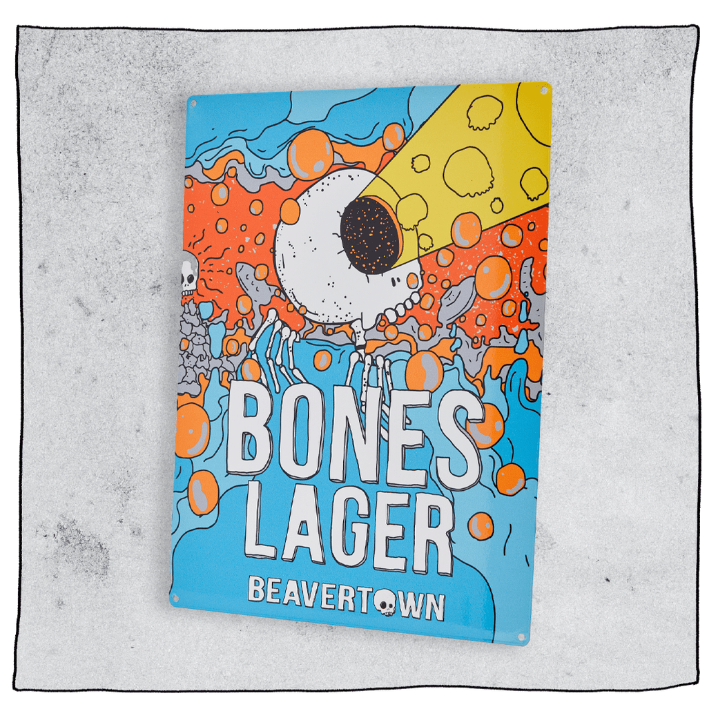 Beavertown Brewery Bones Tin Tacker. Bones illustration on a rectangle piece of metal. Text reads Bones Lager Beavertown.