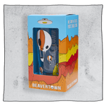Beavertown Neck Oil pint glass inside an orange and blue box in front of a grey background. Box has artwork depicting a white UFO in an orange, yellow and red canyon with a blue sky. Neck Oil pint glass is visible in middle of box and is clear glass with orange and white skull hot air balloons. Grey background.