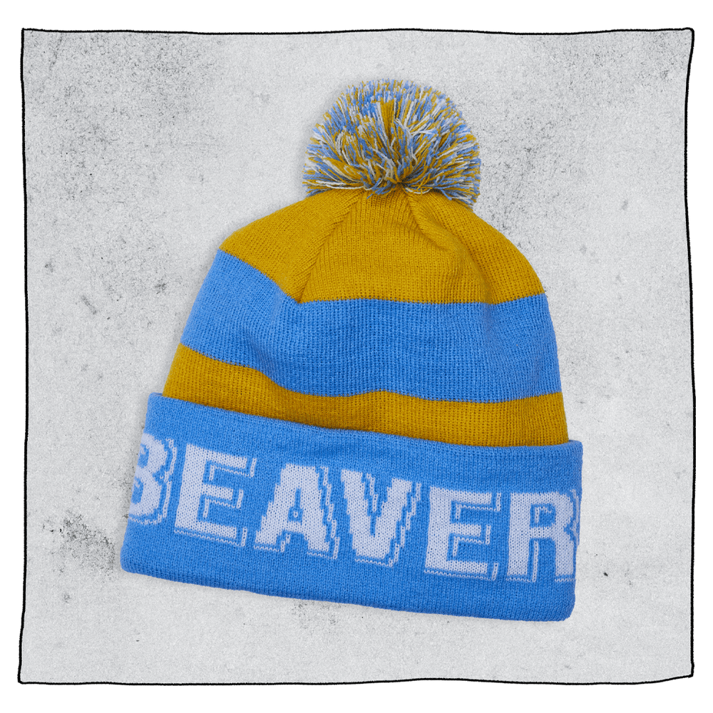 Beavertown Brewery contrast beanie in blue and yellow with a pom pom on the top and Beavertown knitted around it in white