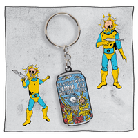 Gamma Ray Keyring with light grey background and 2 Gamma Astronauts next to the key ring. Key ring is a replica of the Gamma Ray can - blue, and orange with Gamma Astronauts in the foreground.