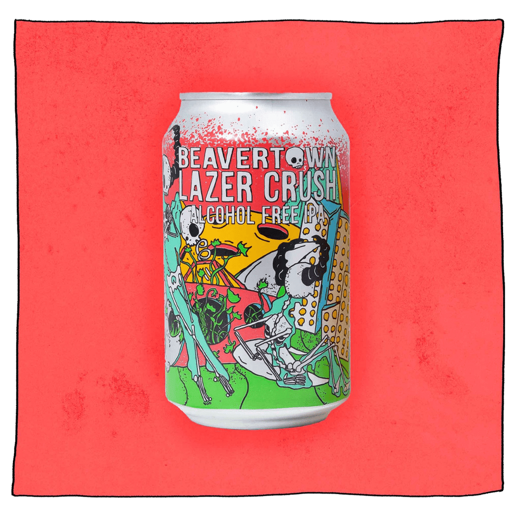 Lazer Crush - Alcohol Free IPA Can in front of a pink background.  Can is silver with blue, pink, green and yellow, with white skeletons dancing and chilling on the green grass foreground.